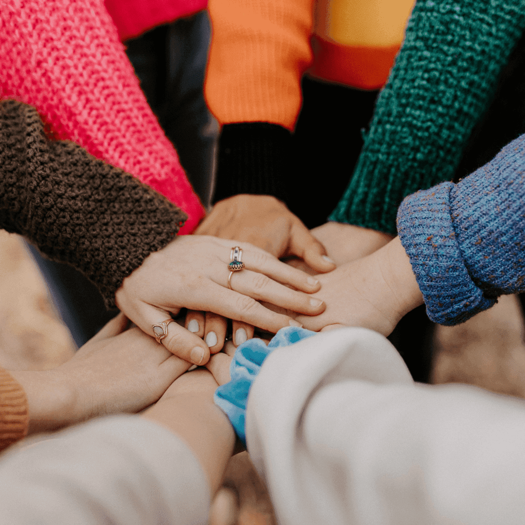 group of people hands together