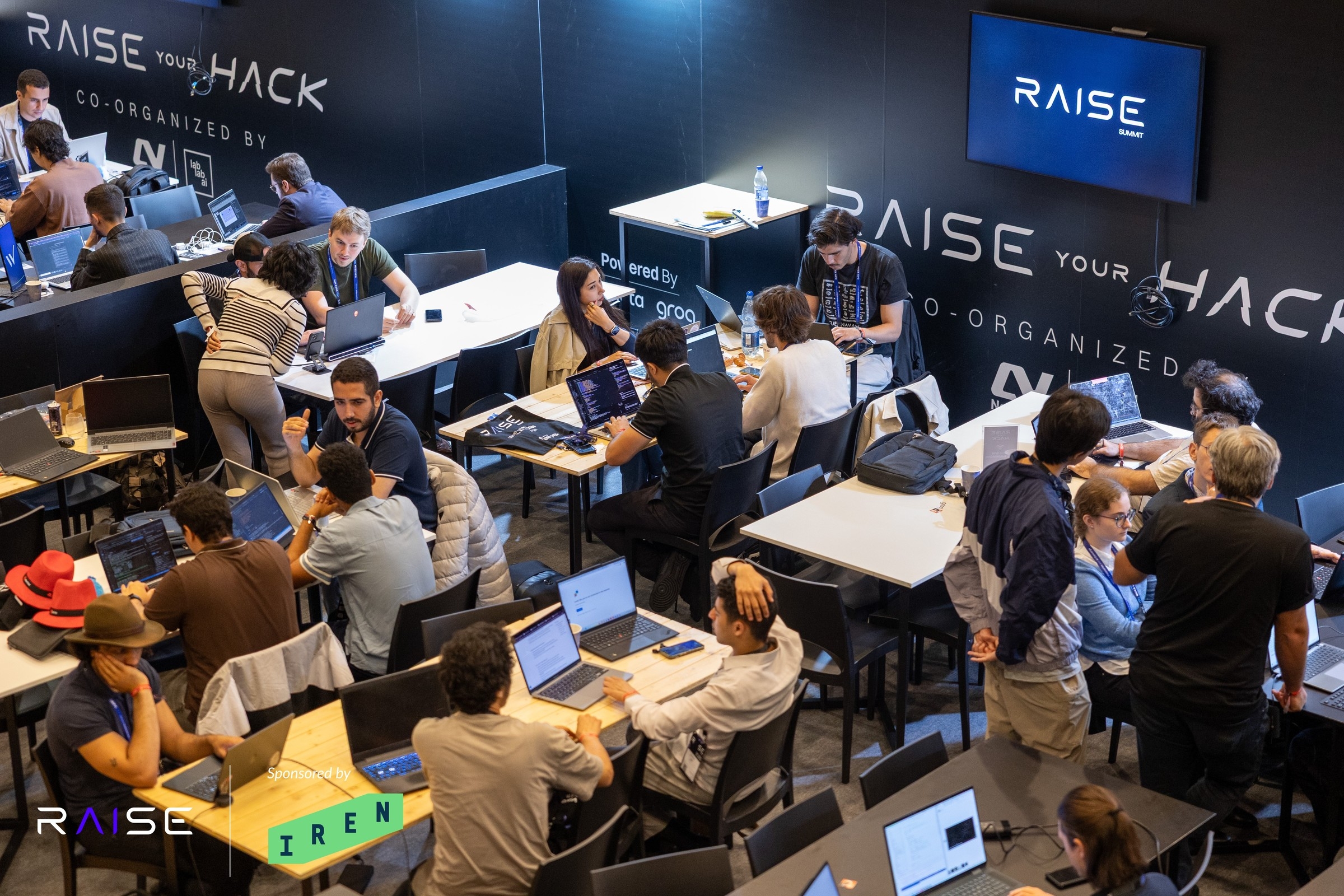 Participants working at Raise Your Hack